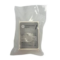 Primed compressed gauze